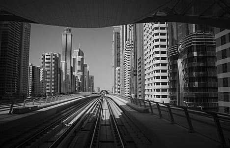 grayscale photography of city buildings thumbnail