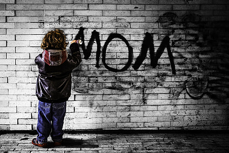 boy spraying mom text on wall thumbnail