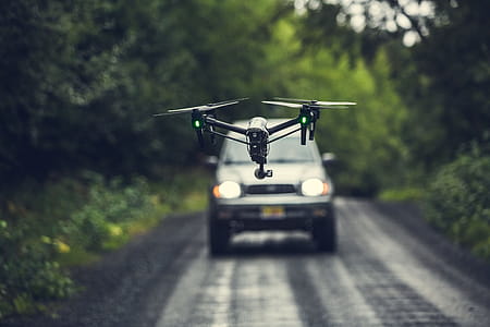 Drone Flying Over Road Photo thumbnail