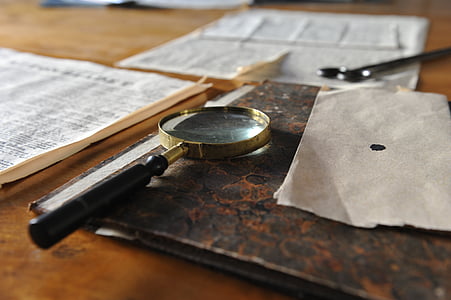 magnifying glass on table thumbnail