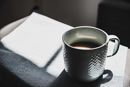 white ceramic teacup selective focus photography thumbnail
