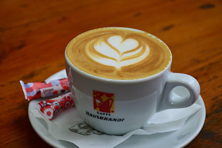 white ceramic teacup on saucer thumbnail