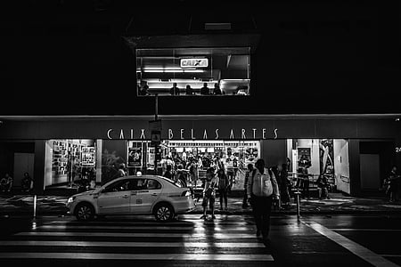 people crossing street near vehicle thumbnail