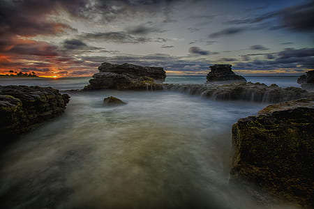 Scenic View of Ocean During Sunset thumbnail