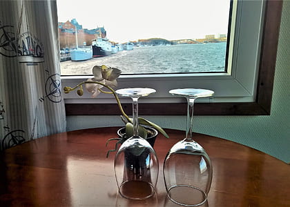 two clear wine glasses on table thumbnail