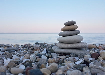 cairn stone on sea shore thumbnail