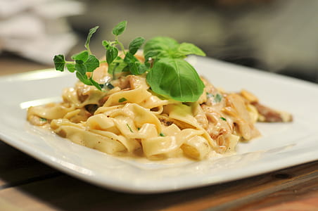 pasta with green leaf spice close-up photography thumbnail