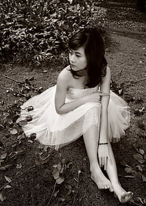 grayscale photography of woman in white cocktail dress thumbnail