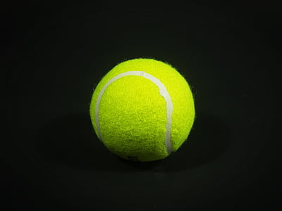 yellow tennis ball close-up photography thumbnail
