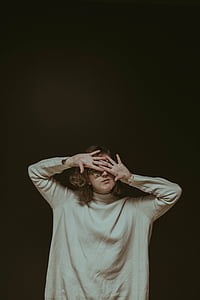 woman raising hands on her face thumbnail