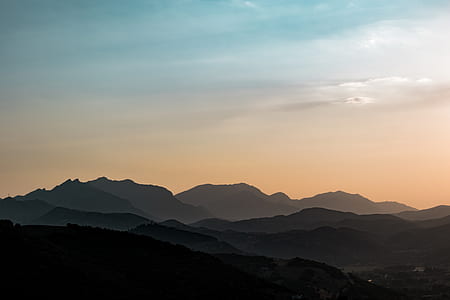 silhouette photo of mountain cliffs thumbnail