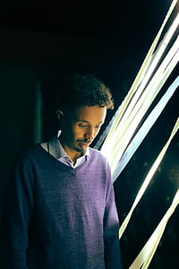 man looking down thumbnail