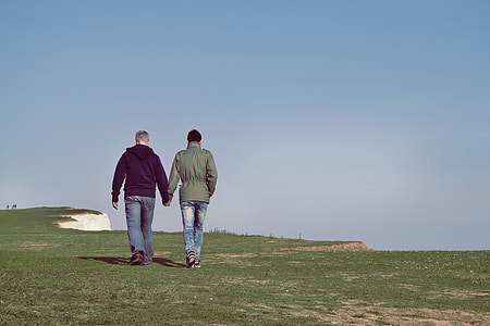 walking on, grass, field, daytime, person, handholding thumbnail