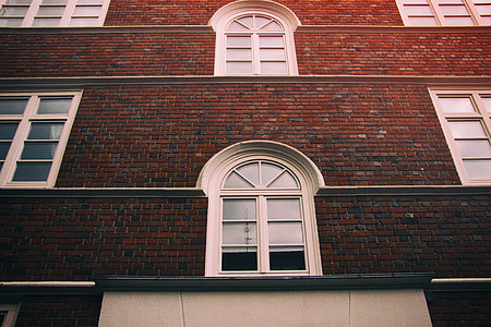 Red brick wall with windows thumbnail