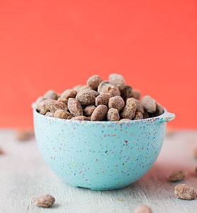 brown nuts in blue bowl thumbnail
