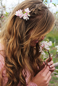 woman holding pink flowers thumbnail