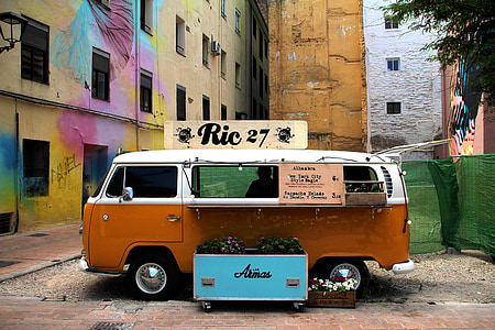 brown and white Volkswagen T2 parked on concrete pavement at daytime thumbnail