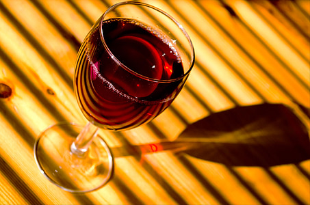 photography of footed glass with wine thumbnail