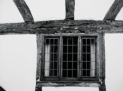 gray wooden window on white wall thumbnail