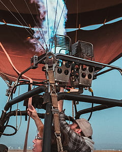 man inflating hot air balloon thumbnail