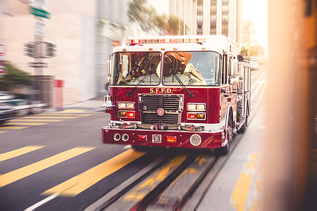 Fire Truck Racing Through The City Traffic thumbnail