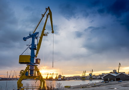 yellow heavy equipment at blue hour thumbnail