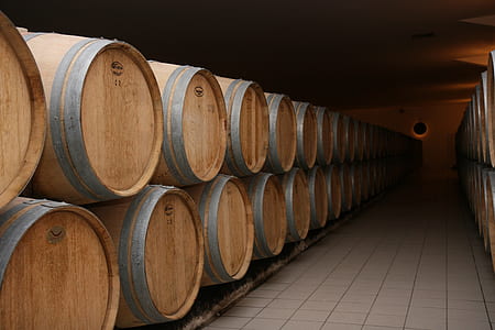 pile of brown wine barrels indoor thumbnail