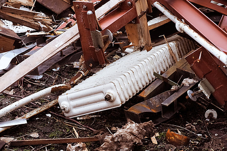 white oil heater underneath wood frame thumbnail