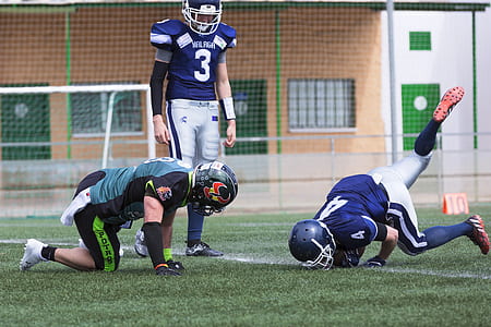 three man playing football game thumbnail