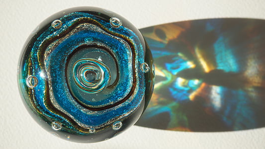 black, brown, and blue marble toy thumbnail