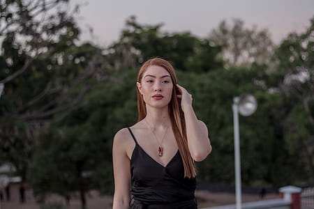 Woman Wearing Black Spaghetti Strap Top thumbnail