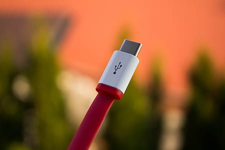 closeup photography of white and red USB cable thumbnail