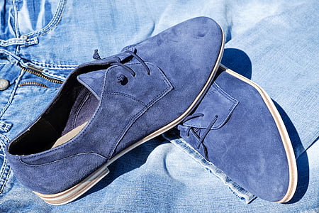 pair of blue suede chukka shoes on blue denim shorts - thumbnail