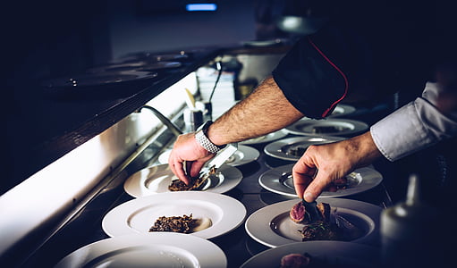 person preparing food served on plates thumbnail
