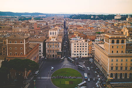 aerial photography of concrete road and concrete buildings at daytime thumbnail