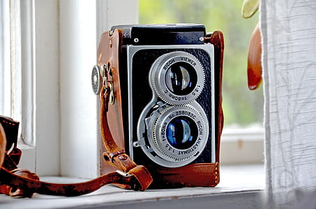 black and brown vintage camera thumbnail