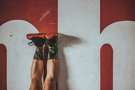 person wearing black-and-green boots thumbnail