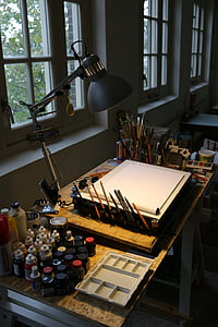 closeup photo of sketch table set with lamp thumbnail
