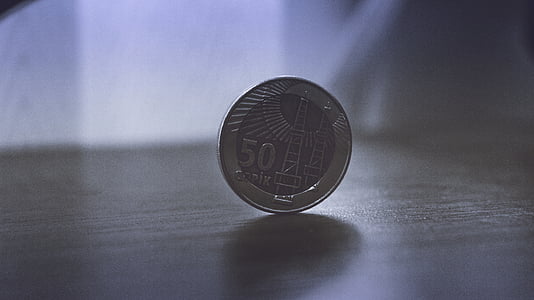 round silver-colored coin thumbnail