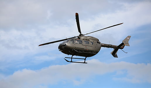 helicopter in mid-air during daytime thumbnail