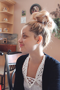 woman wearing blue cardigan thumbnail