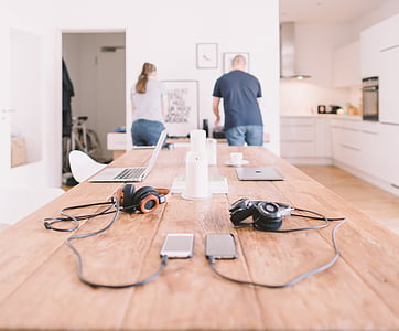 two black phones with black headsets thumbnail