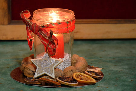 red candle in clear glass candle holder thumbnail