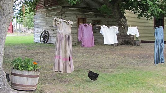 clothes hanging on drying rack thumbnail