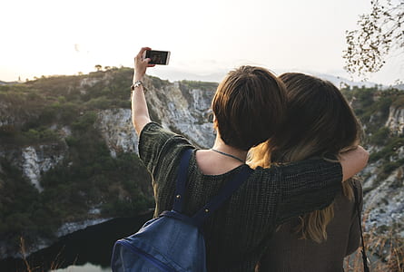 two person taking selfie thumbnail