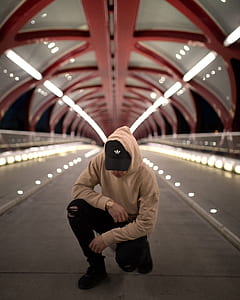 man in brown pullover hoodie thumbnail