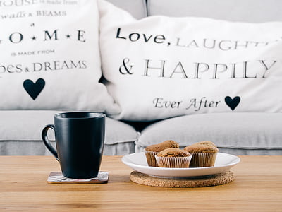 three muffins on plate near black ceramic mug thumbnail