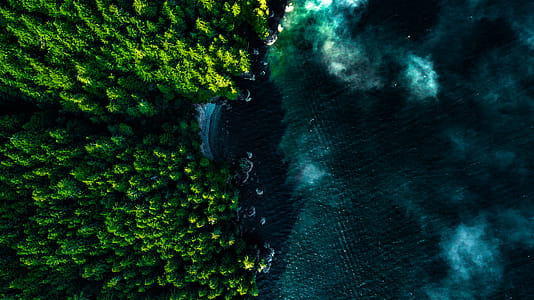 Aerial Photography of Sea Near Island thumbnail