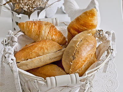 croissant breads on white metal basket thumbnail