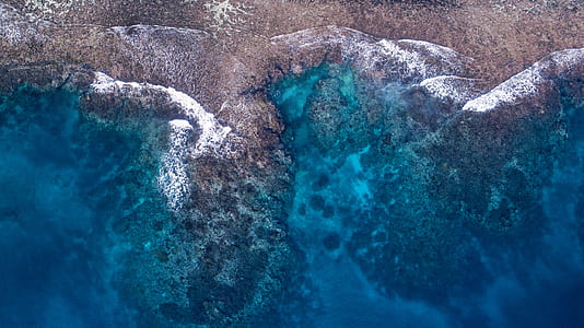 top view photography of seashore thumbnail